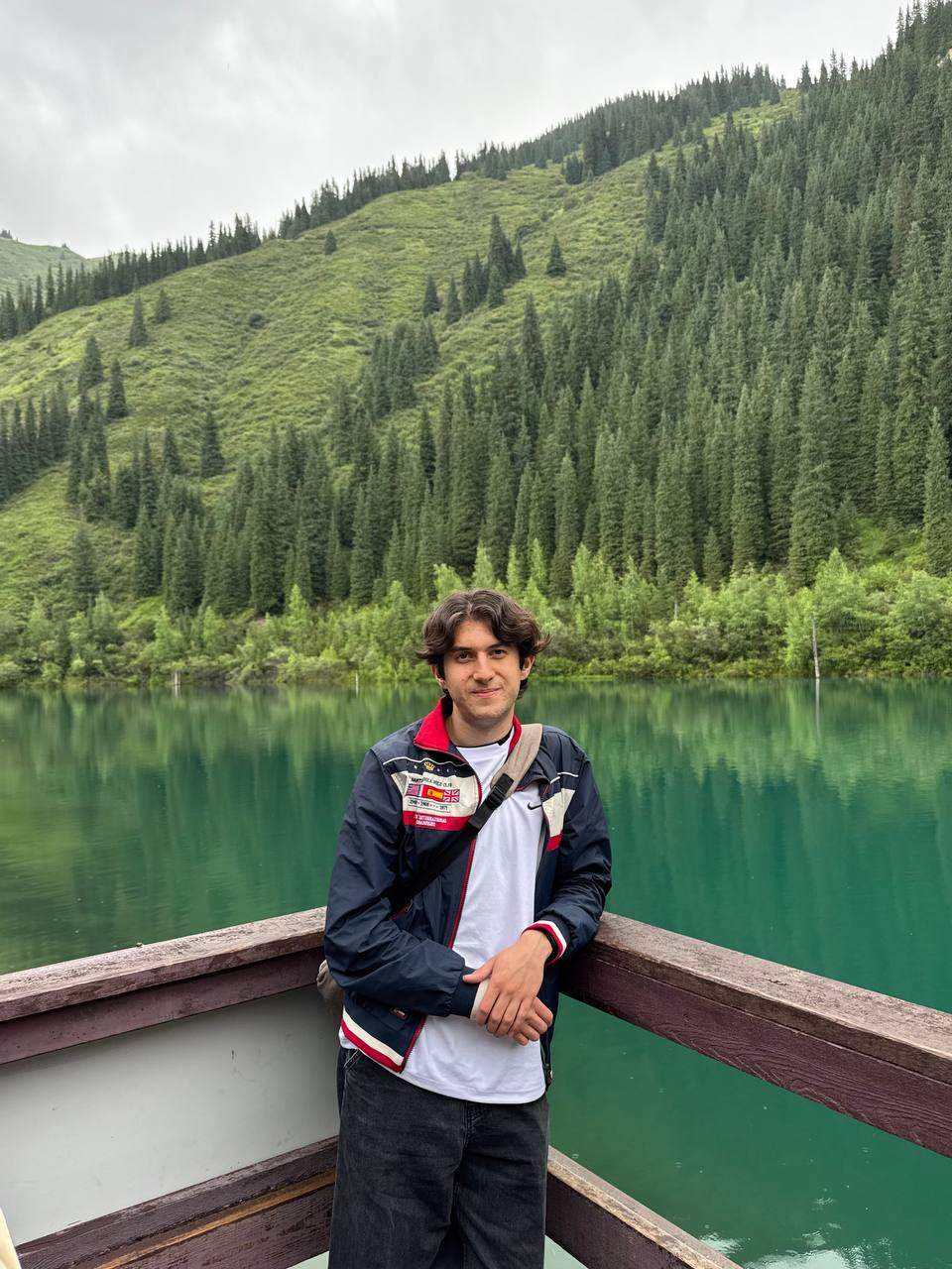 Alisher Amirov at a mountain lake